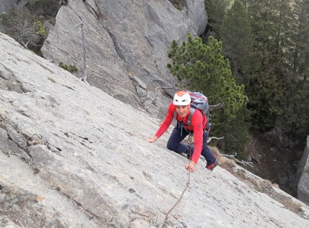 Climber climbing up