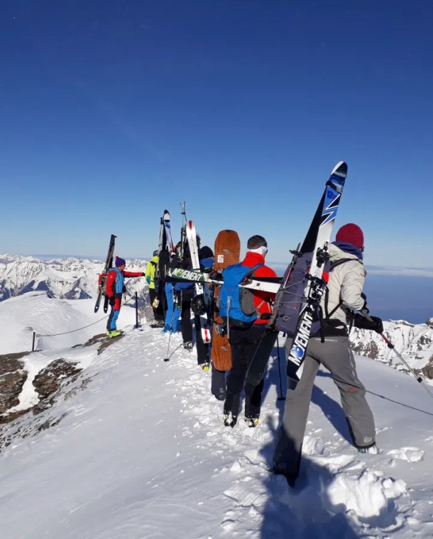 Ski tourers on the summit of Schwalmere.